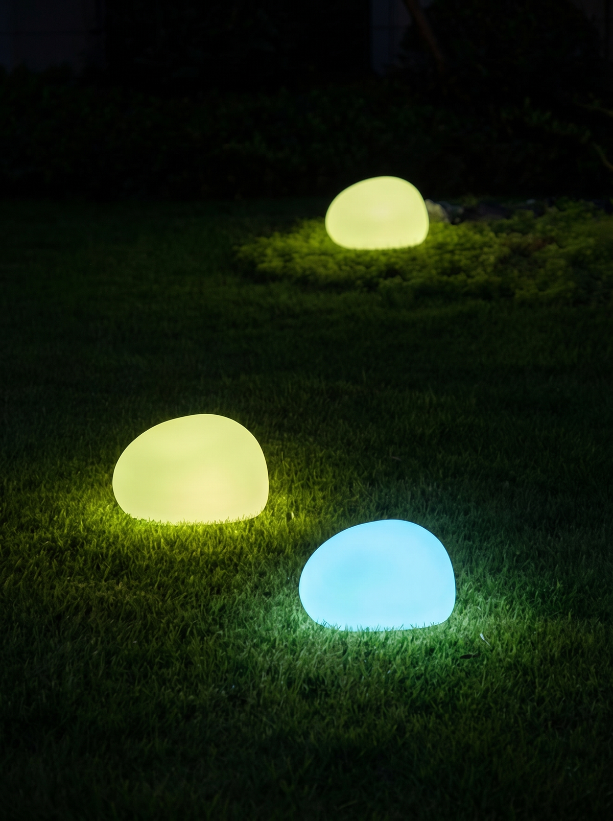 Solar Globe Lawn Light lit at night
