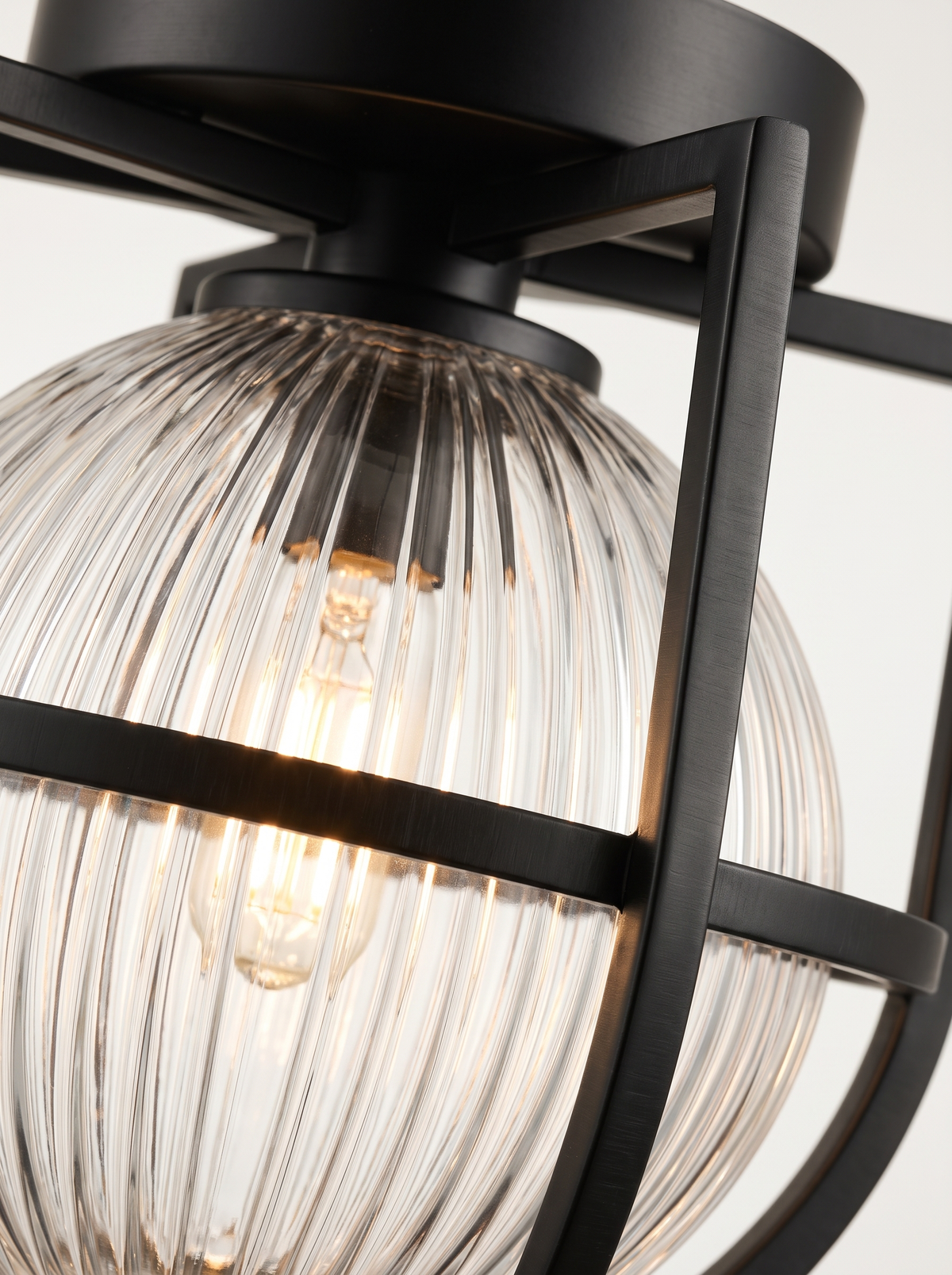 Glass iron orb light close up