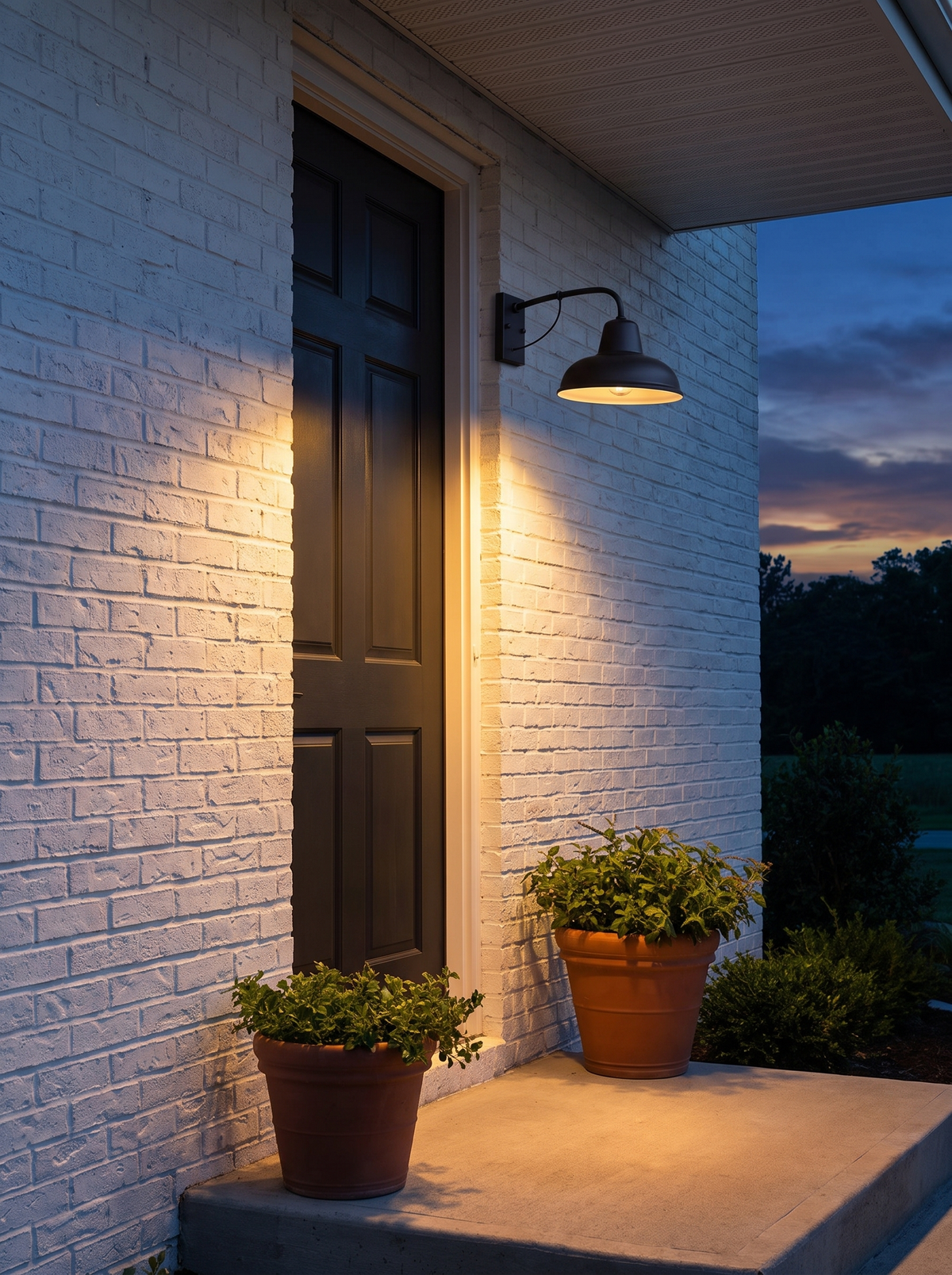 Iron barn outdoor wall sconce beside door