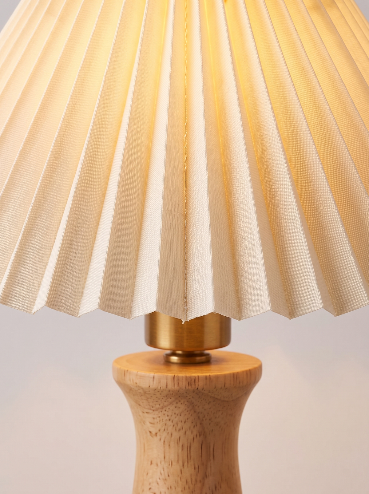 Pleated wooden table lamp close up