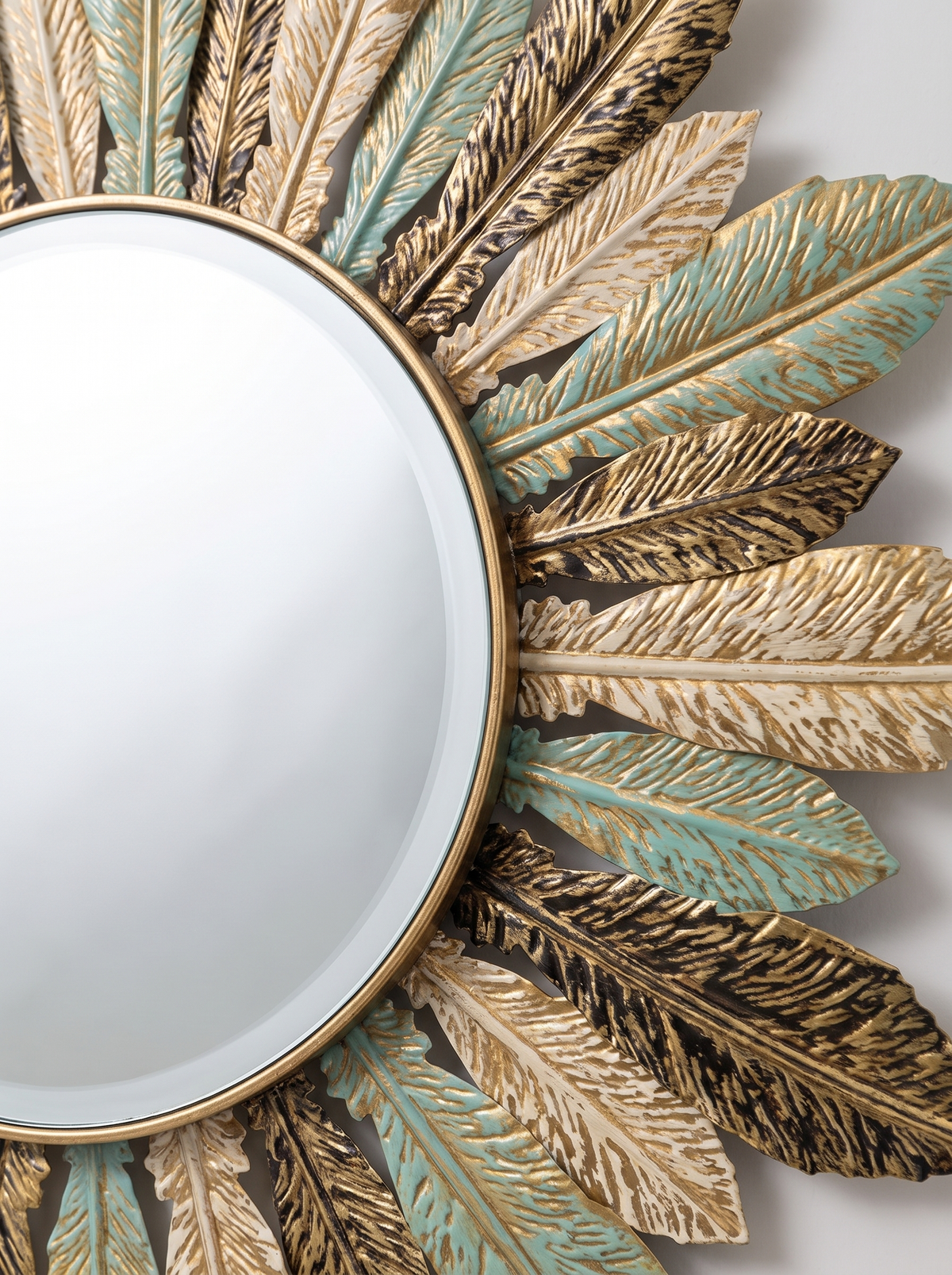 Sunburst metal mirror leaf detail close up