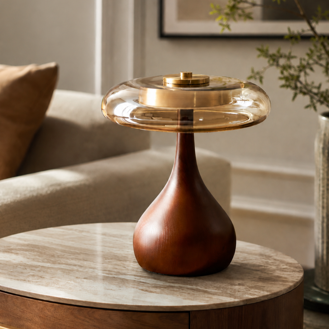 Veyra glass lamp styled in a living room beside seating