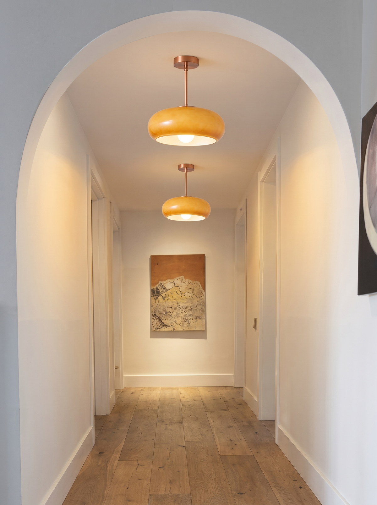 glass and copper dome pendant in a modern interior