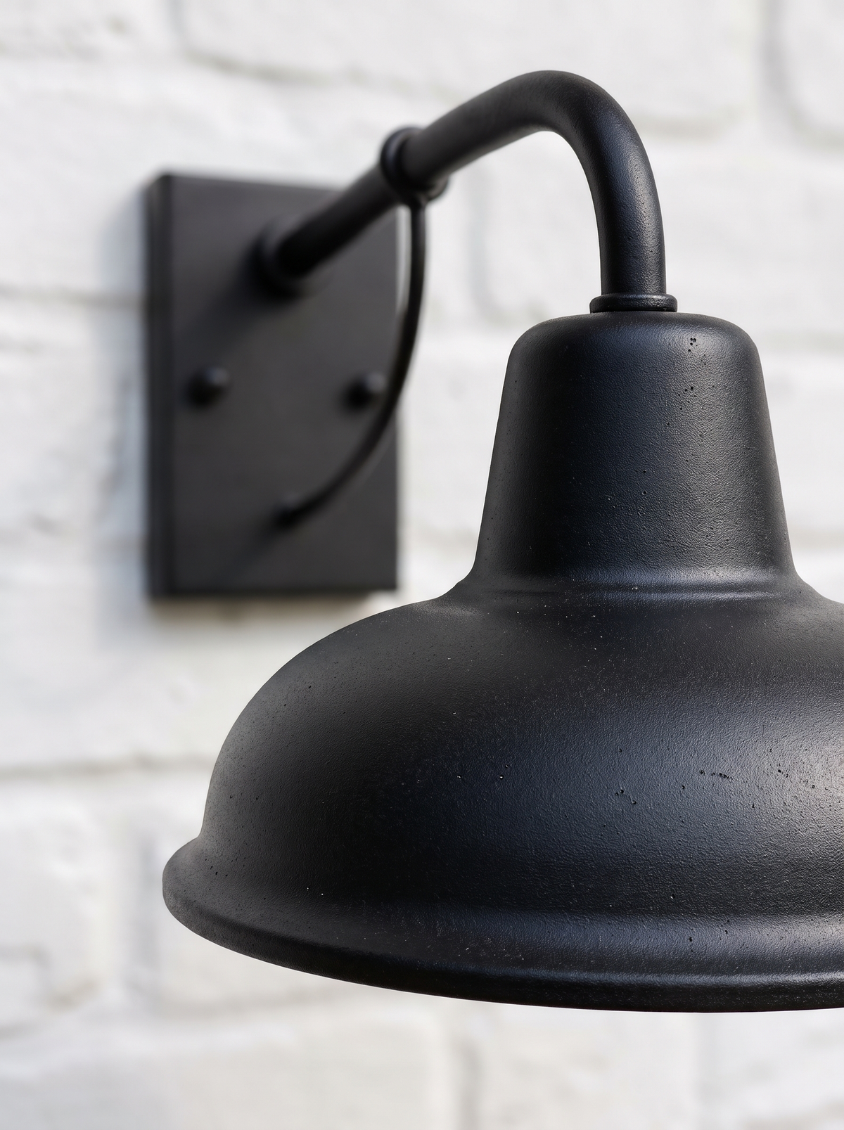iron barn wall light close up material detail